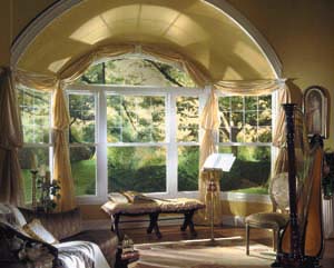 A large bay window in a living room